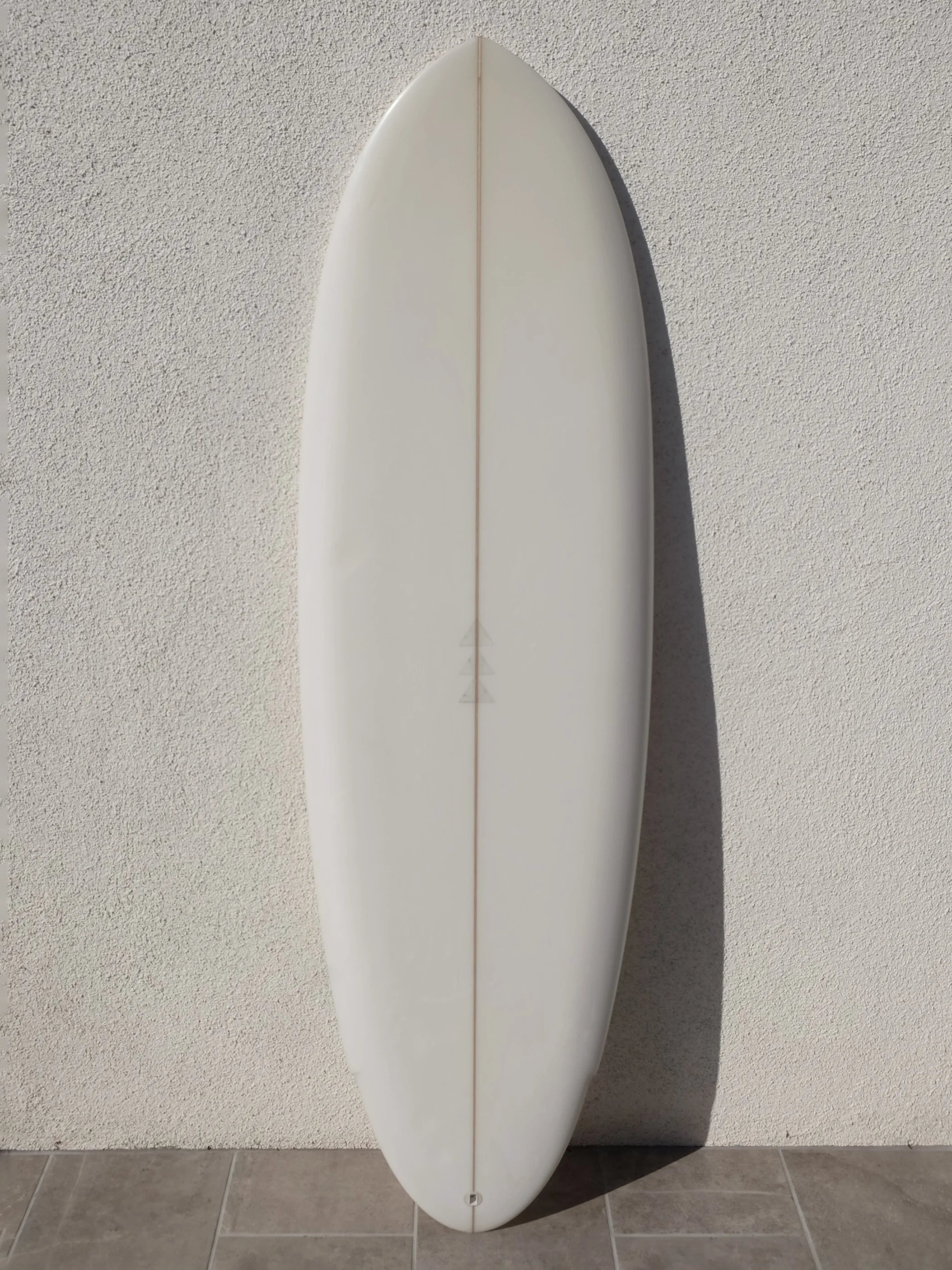 longboard surfboards with smooth rail-to-rail transitions-Furrow | 5’10” Floyd Pepper Clear Surfboard (USED)